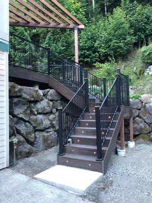 Stairway that we built, complete with lights in each step and post cap.