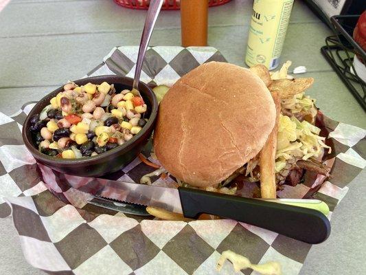 Beef brisket sandwich (with "Cleveland" toppings) and a side of bean and corn salsa