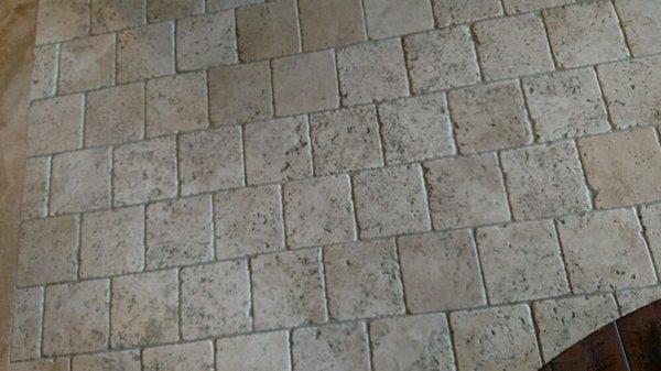 After (make sure you always seal your tile so the dirt and grime doesn't stain the grout/tile)