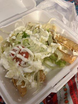 Tacos tapatios. Chicken flautas with ranchero sauce , mozzarella cheese, sour cream, lettuce & tomato.