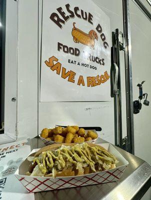 Dog, tots and the sign