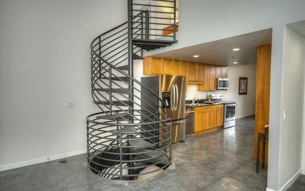 This three level loft in the Dogpatch features soaring barrel ceilings