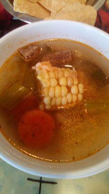 A little bowl of caldo de res comes with your meal at Delicias Cafe