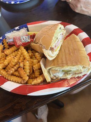 Cuban sandwich with fries.