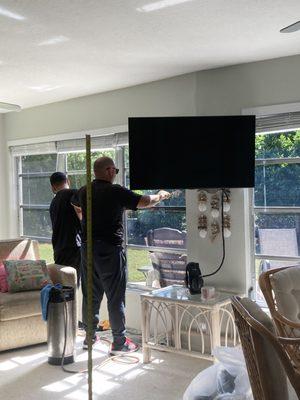 Alex and Dennis working on our windows.