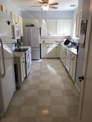 Kitchen with 3 refrigerators for personal food items