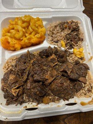 Oxtails, peas and rice, and Mac and cheese