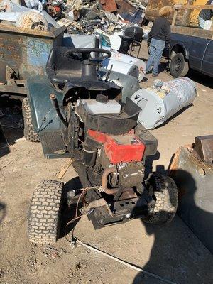 Old lawn tractors and hot water heaters