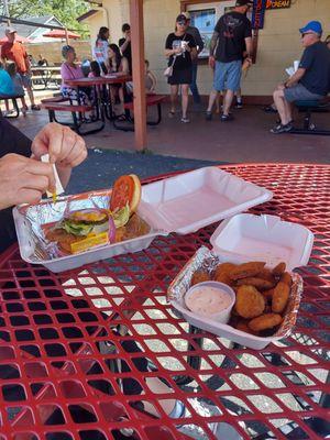 Pork tenderloin sandwich with fried pickles