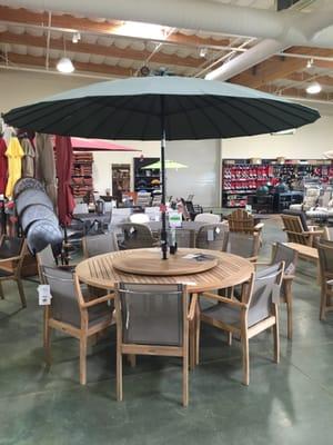 Umbrellas and dining sets.  We literally have thousands of colors of fabrics and finishes you can choose.  It's custom!