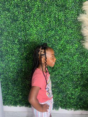 Kid's braided styles | small knotless with Bantu knots and a heart shape