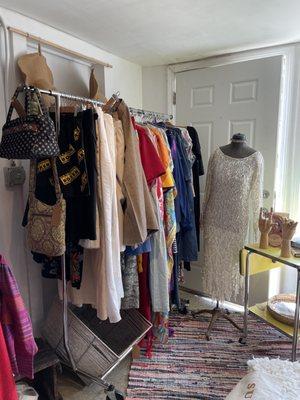 Vintage clothing for sale in the adjoining room