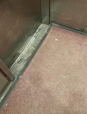 Our elevator floor before the tiles! I didn't want to use the elevator! What a difference an upgrade makes! NYC.