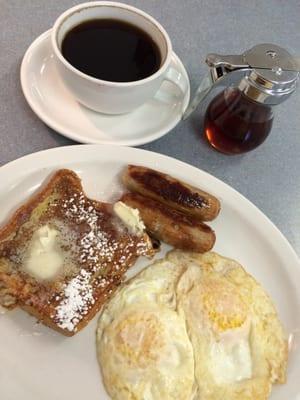 French toast with over easy and sausage