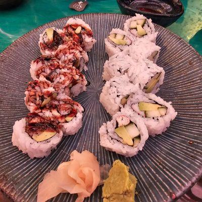 Eel roll (with the only bad Eel sauce I've ever tasted) on the left. Bad California Roll. You get better rolls at the supermarket.