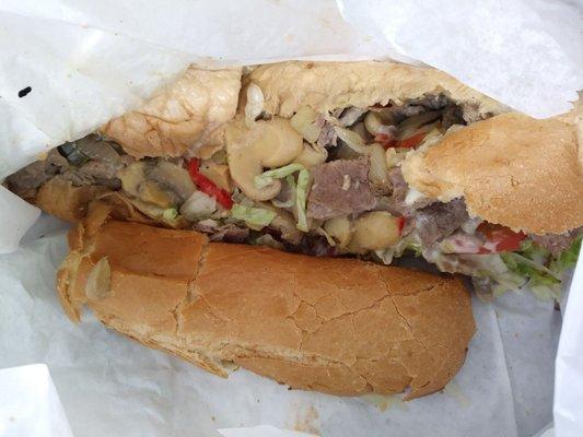 This is the Steak Bomb!  Soggy Bread Bland tasteless steak and canned veggies..  Horrible experience