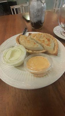 Beef empanadas. Chimichurri and Spicy sauces.