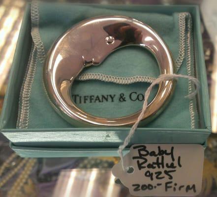 Silver (.925) baby rattle from Tiffany and Co., $200 firm. This is what distinguishes a Goodwill BOUTIQUE.