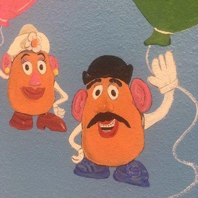 Mr. Potato Head showing off his braces!  While the Mrs. poses and falls with style!