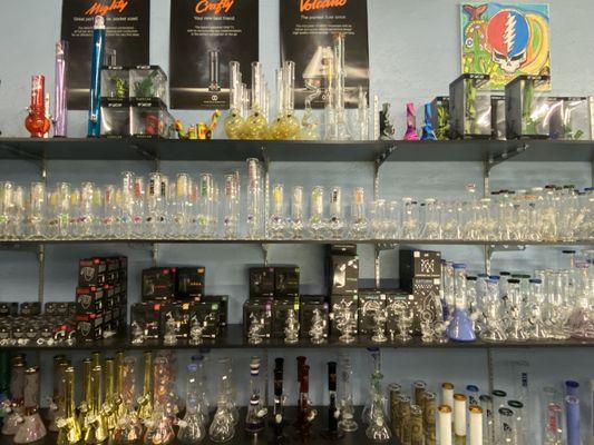 Assorted glass bongs and wax rigs.