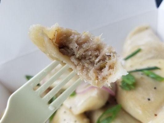 Inside a mushroom sauerkraut pierogie