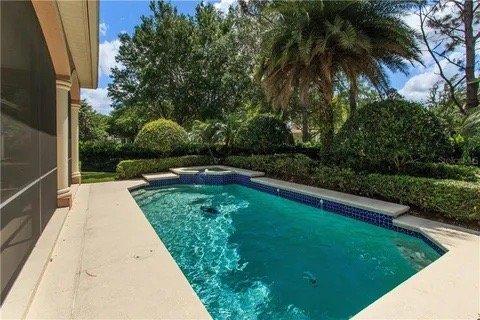 Pool and hot tub before renovation.