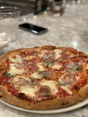 Margarita pizza with prosciutto added