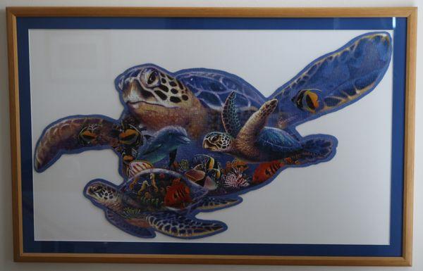 45" X 30" Puzzle custom mounted, matted and framed. Awesome!