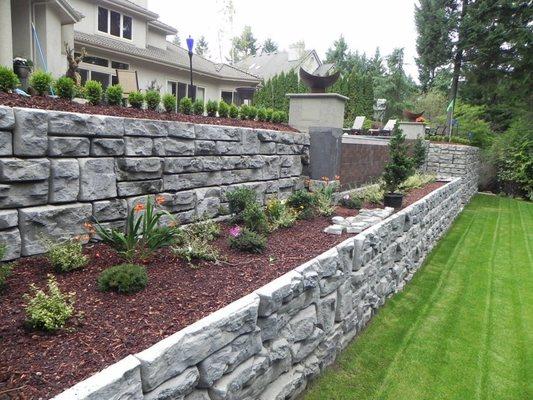 Stone Walls With Sod And Garden