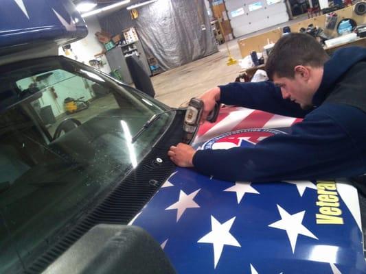 Jake installing a windshield.