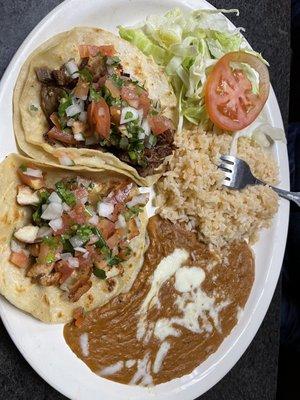 Chicken & pork soft taco; rice hardened and beans (give credit for presentation)