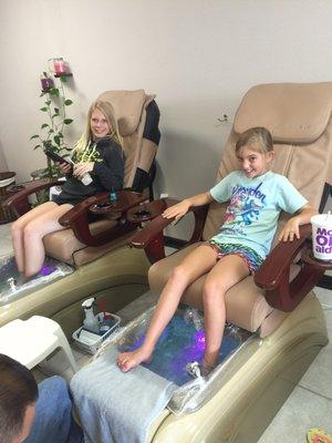 2 out of 5 of my girls enjoying a pampering at Serene Nail Spa