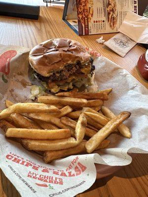 The Oldtimer w/Cheese* hamburger with fries.  Burnt edges on hamburger with generous toppings!  Love their fries too.