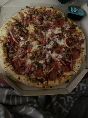 Medium meat lovers pizza