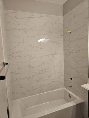 Tub upgrade with 12x24 porcelain tile surround