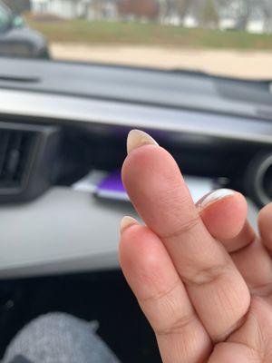 the chunky acrylic under my nail