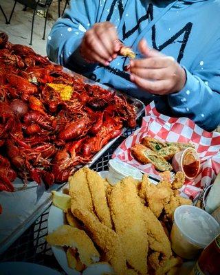 Crawfish, Boudain egg rolls, and fried catfish and shrimp plate.