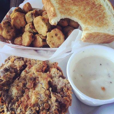 Country fried steak with fried okra.