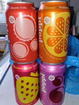 New "prebiotic" Poppi Sodas. Classic Cola, Dr. Pop, Strawberry Lemon, and Orange. These were advertised during the SB.