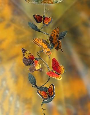 Our depiction of a wonder of nature.  Captivating circular flight is created with colorful and realistic magnetized butterflies