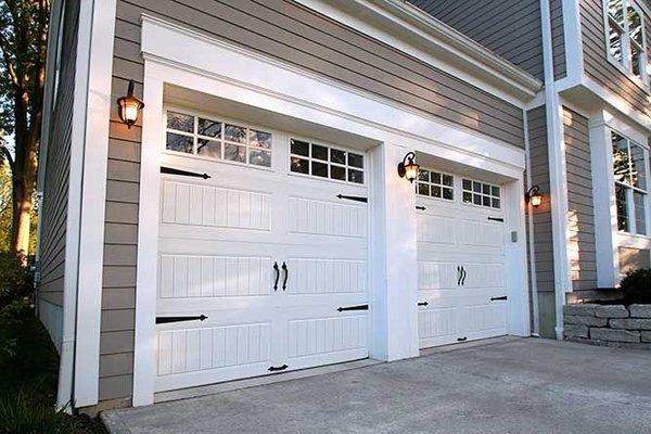 White Vinyl Back Insulated Door/ with glass pane and window accents.