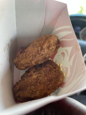 Burnt grease fried chicken nuggets