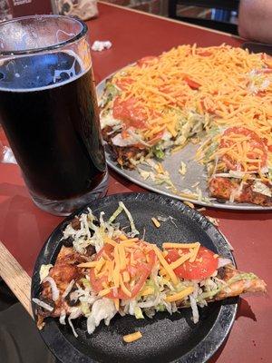 Taco Especiale Pizza and black ale on tap