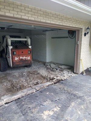 Inside garage pad removal and repour.will send pics tmrw of new floor