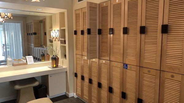 Women's lockers with small vanity area and toiletries