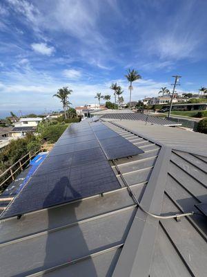 Standing seam metal roof and solar installed