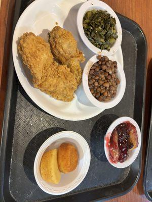 Fried chicken boneless breast and bone-in drumstick; crowder peas, collard greens; cornbread muffins; blackberry cobbler