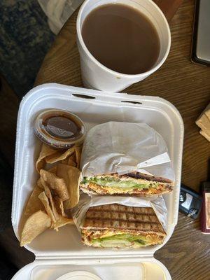 Café de Ollo and breakfast torta with bacon and chorizo.