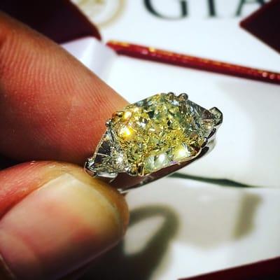 Custom made 5.50 carat fancy yellow diamond GIA certified. This beautiful ring was custom made for a customer at our location.