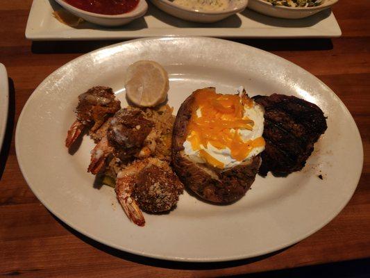 Baked potatoe loaded, 6oz steak and stuffed shrimp